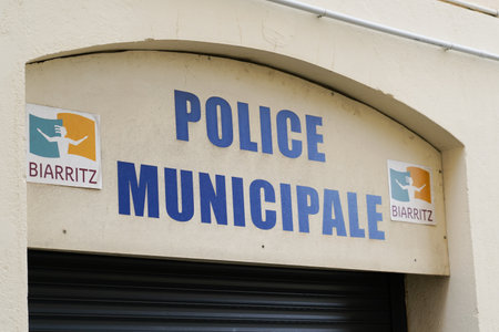 police municipale logo and sign in french Biarritz city under office buildingのeditorial素材