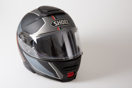 Bordeaux, Aquitaine / France - 09 25 2020: shoei gray black shiny motorcycle flip up helmet flip-front isolatedのeditorial素材