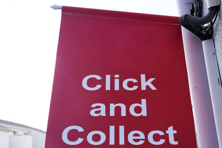 click & collect flag text banner online internet shopping sign at door shop