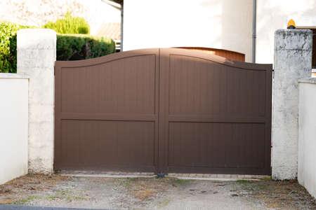 portal brown clear home suburb metal aluminum house gate street wallの写真素材