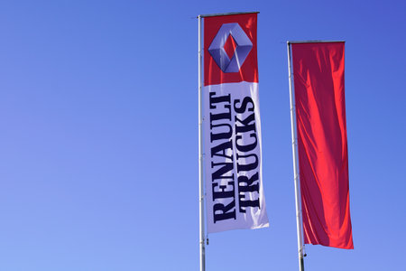 Bordeaux, Aquitaine France - 11 21 2020: Renault trucks sign and red logo on sky flags front of dealership store bus van truck dealerのeditorial素材