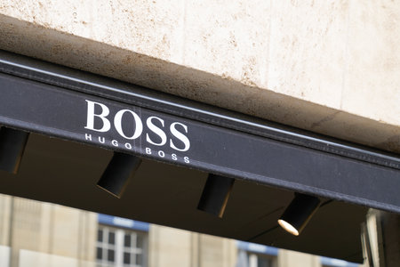 Bordeaux, Aquitaine France - 11 21 2020: Hugo Boss logo text and shop sign front of clothes store...
