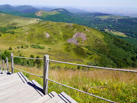 stairs wooden pathway on volcano puy de dome mountainの写真素材