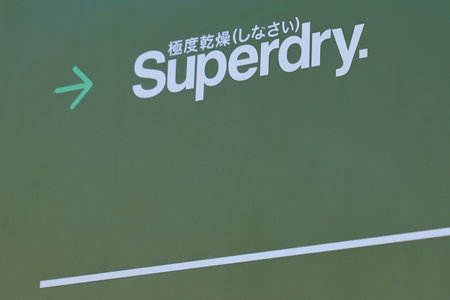Bordeaux, Aquitaine France - 12 25 2020: Superdry logo brand and text sign shop front of store...