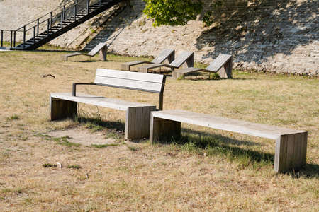 Vichy city docks with modern wooden bench aside Allier river in Auvergne Franceの写真素材