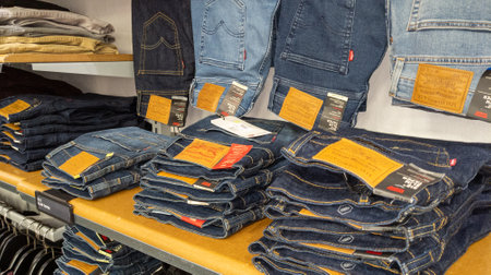 Bordeaux, Aquitaine France - 01 05 2021: levis jeans placed on the shelves of the store for sale...