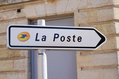 Bordeaux, Aquitaine France - 01 18 2021: La Poste logo brand and text on traffic sign for office shop post agency in Franceのeditorial素材