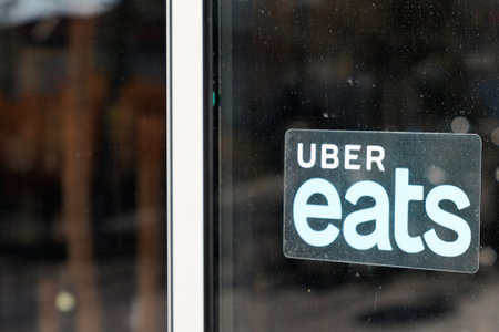 Bordeaux, Aquitaine France - 01 18 2021: Uber eats sign brand and text logo front of windows of...