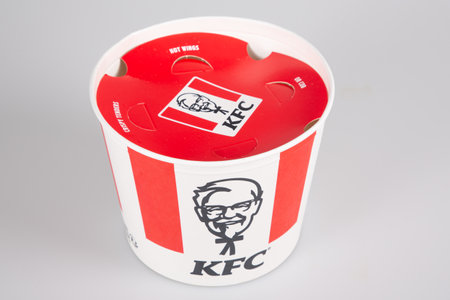 Bordeaux, Aquitaine France - 01 24 2021: kfc sign brand Kentucky Fried Chicken Restaurant on box round Buckets fast food american restaurant chainのeditorial素材