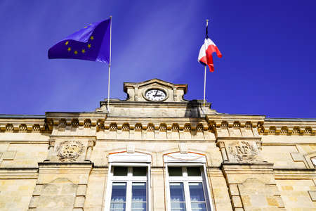 French and eu europa flag on town hall building mean city hall in town in franceの写真素材