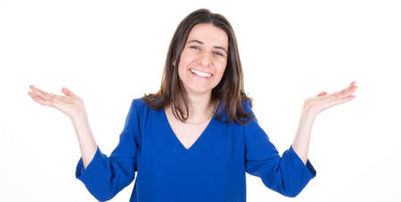 young happy brunette woman presenting product in two both palm hand