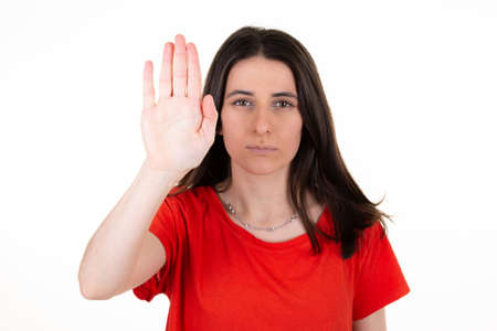 woman sad brunette with her hands signaling to stop domestic violence