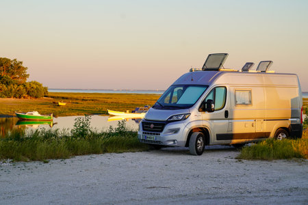 ares, Aquitaine France - 02 16 2021: Fiat Ducato Campereve in sunset holidays motorhome and campervan parked by the sea sideのeditorial素材