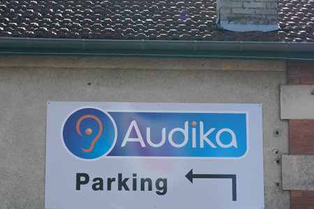 Bordeaux, Aquitaine France - 02 25 2021: Audika logo brand and text sign parking front of store hearing aid distribution shop companyのeditorial素材