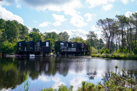 Lacanau, Aquitaine France - 03 18 2021: Talaris Marina Bay water village of french wood house hut in Lacanau lake franceのeditorial素材