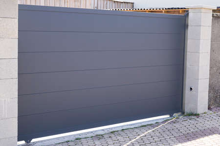 gray dark home steel door sliding aluminum gate slatsの写真素材