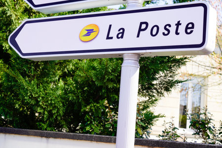 Bordeaux, Aquitaine France - 03 22 2021: La Poste logo brand and text on arrow city traffic sign for office shop post agency in town Franceのeditorial素材