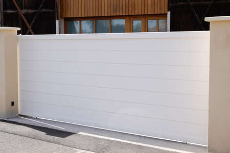 high white pvc plastic home gate portal of suburbs house street city