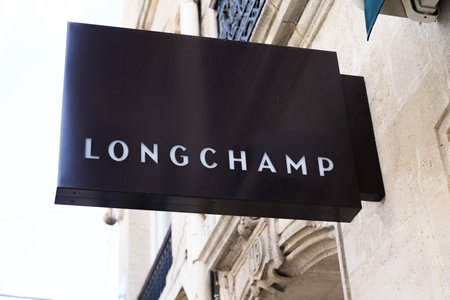 Bordeaux, Aquitaine France - 04 10 2021: Longchamp sign text and logo of store Luxury french shop...