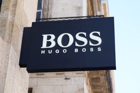 Bordeaux, Aquitaine France - 04 10 2021: Hugo Boss logo brand and text sign on entrance shop luxury store of German boutique fashionのeditorial素材