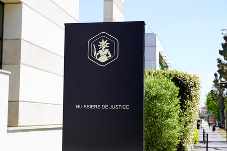 Bordeaux, Aquitaine France - 04 15 2021: huissier de justice logo brand and text sign on empty blank panel in france means office bailiff in Frenchのeditorial素材
