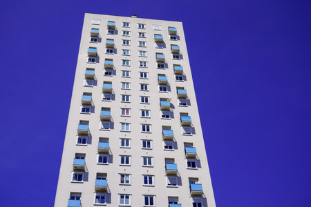 modern cubic building with windows balcony in geometric architecture