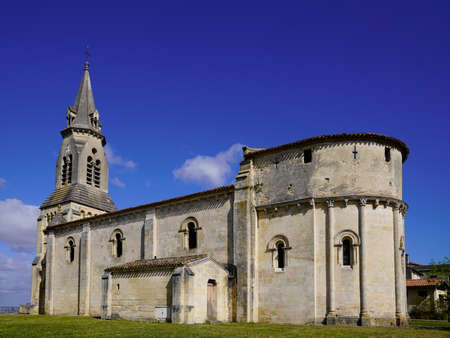 Medieval church in blue summer sky in the historic town of Bouliac in Bordeaux city Franceの写真素材