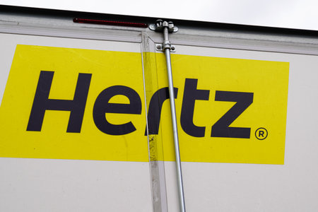 Bordeaux, Aquitaine France - 05 14 2021: Hertz logo brand and text sign of American car rental...