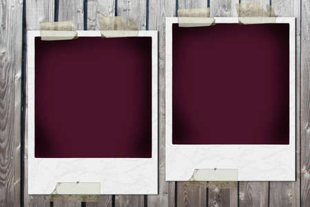 Blank aged photo printing tape on plank old used brown wooden background with ancient photographic printの写真素材