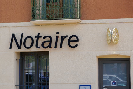 Bordeaux, Aquitaine France - 05 27 2021: notaire french text sign and golden plate notary logo in wall building officeのeditorial素材