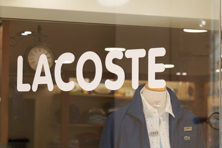 Toulouse, Occitanie France - 06 06 2021: Lacoste logo brand fashion shop and text sign store on facade boutique of French clothing companyのeditorial素材