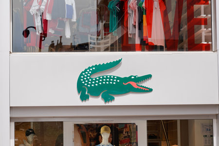 Toulouse, Occitanie France - 06 06 2021: lacoste crocodile logo brand fashion shop and text sign...