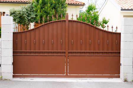 brown steel retro design metal gate door house portal of suburb home