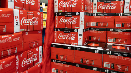 Perpignan, Occitanie France - 06 06 2021: Coca Cola sign brand and text logo can and bottle on store...