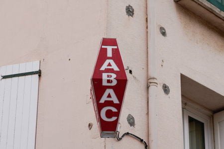 Toulouse, Occitanie France - 06 06 2021: French Red text label shop tobacco sign brand french tabac store logoのeditorial素材