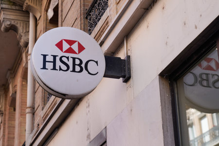 SÃ¨te, ocitanie France - 06 25 2021: HSBC sign text office and red logo brand front of swiss bank agency in city center streetのeditorial素材