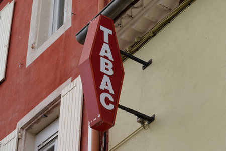 Toulouse, Occitanie France - 06 16 2021: Tabac french Red brand logo and store tobacco text sign on shop retail in franceのeditorial素材