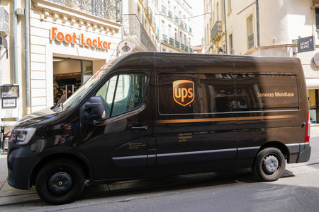 SÃ¨te, ocitanie France - 06 30 2021: UPS Delivery brown Truck panel van with logo text and sign brand in street deliveryのeditorial素材