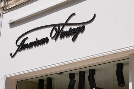 toulouse, occitanie France - 06 25 2021: american Vintage sign text store and logo brand shop on facade boutique French fashion labelのeditorial素材