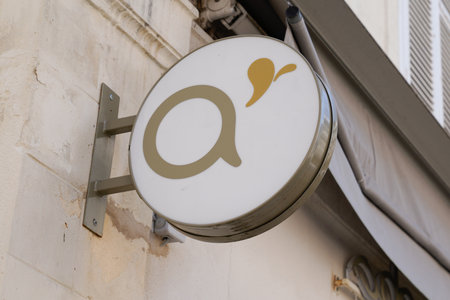 toulouse, occitanie France - 06 25 2021: adopt sign text store and logo brand shop on facade boutique chain of cosmetics adopt 'in franceのeditorial素材