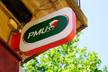 Perpignan, Occitanie France - 06 25 2021: PMU logo brand and text sign front of store of french horse race bet sport organizationのeditorial素材