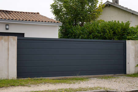 gray dark slide home steel door sliding aluminum gate slatsの写真素材