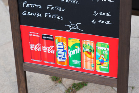 Bordeaux, Aquitaine France - 08 25 2021: Coca Cola fanta sprite tropico fuze tea sign text and logo on coffee panel front of terrace restaurant cafe in city streetのeditorial素材