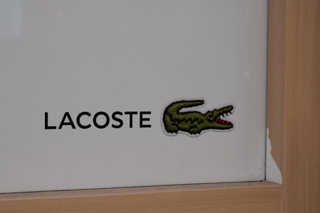 Bordeaux, Aquitaine France - 09 10 2021: Lacoste logo brand store sign text shop sport French fashion companyのeditorial素材