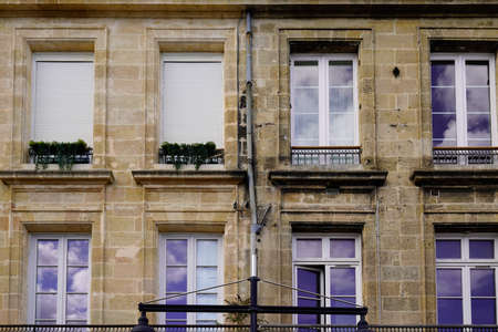 Outside clean renovation building facade before and after cleaning wash wall house with industrial pressure water in city facade exteriorの写真素材