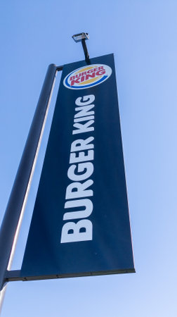 Bordeaux, Aquitaine France - 10 25 2021: Burger King logo brand and text sign on flag restaurant us fast food franchiseのeditorial素材