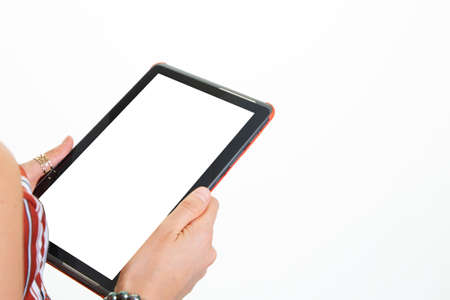 hand woman holding tablet computer with blank empty white screen mockup