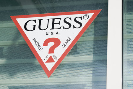 Bordeaux, Aquitaine France - 11 21 2021: Guess usa washed jeans logo and sign text on storefront...