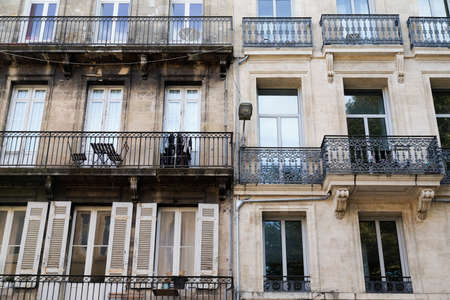 facelift difference between ancient wash cleaned old house building facade wall and face lift dirty one before and after cleanの写真素材