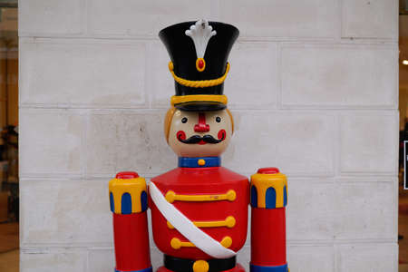 traditional figurine christmas nutcracker wearing an old military style in Red Uniformの写真素材